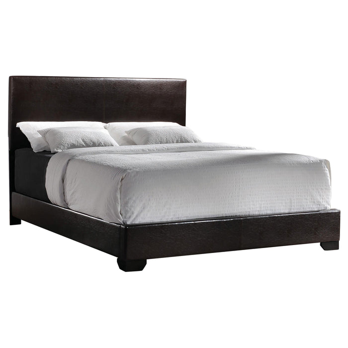 Conner Eastern King Upholstered Panel Bed Dark Brown image