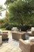 Beachcroft Beachcroft Fire Pit Table with Four Nuvella Swivel Lounge Chairs - American Home Express Outlet (San Antonio, TX)